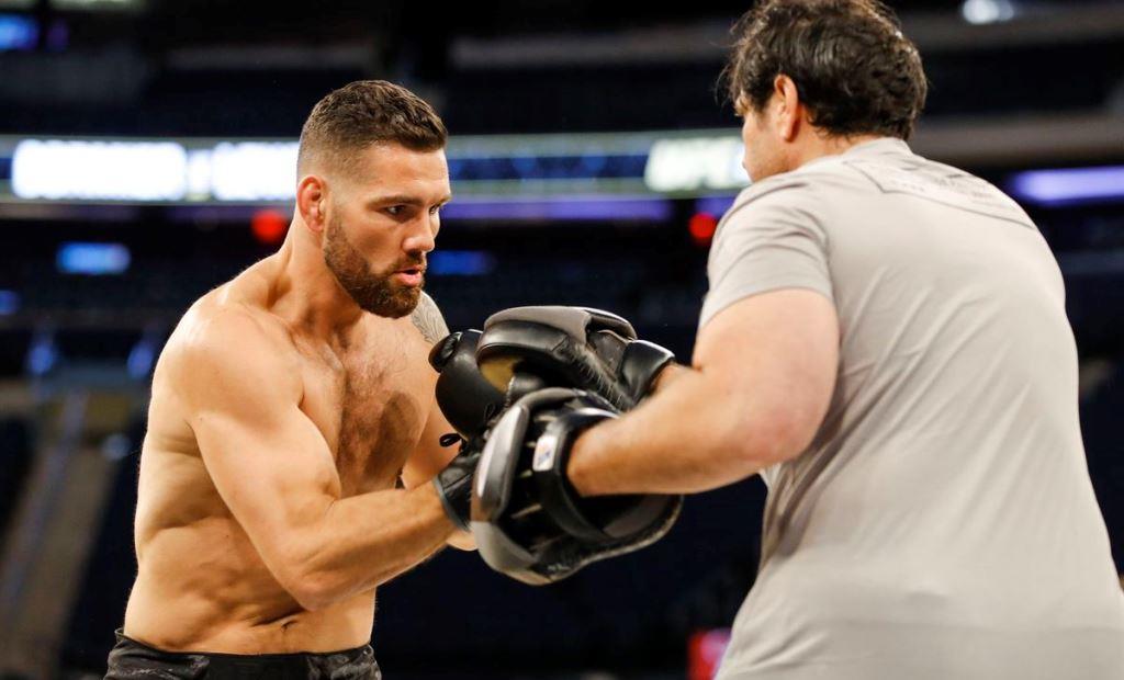 Chris Weidman returns to training after severe fracture with Uriah Hall