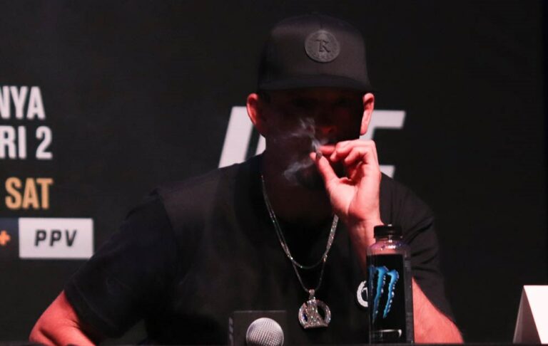 Nate Diaz smokes a joint at UFC 263 press conference and offers Brandon Moreno a hit (Video)