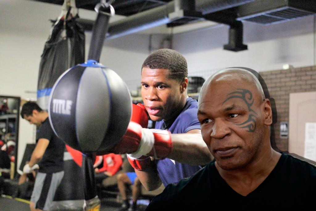 Mike Tyson shares a picture with young Devin Haney