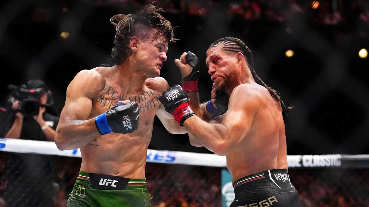 Diego Lopez react to Brian Ortega's bruised face after UFC 306 fight