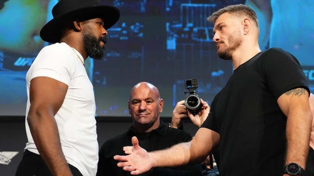 Jon Jones explains the message for Stipe Miocic during a tense UFC 309 press conference staredown